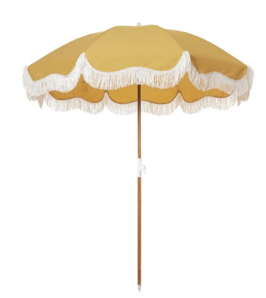© Holiday beach umbrella vintage gold